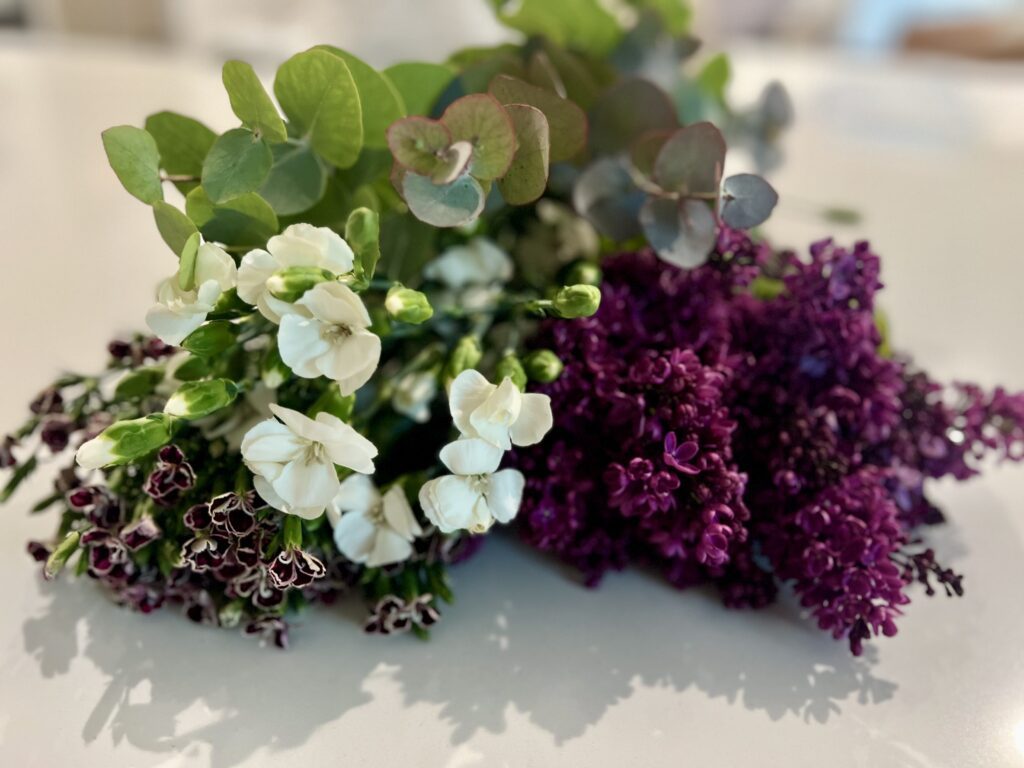 You will need: French lilac, eucalyptus, white dianthus, purple and white dianthus