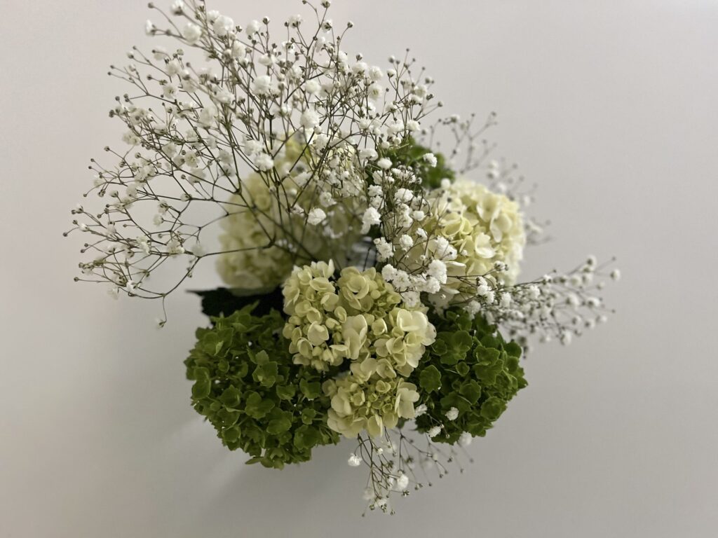 The white hydrangeas, added in open spaces